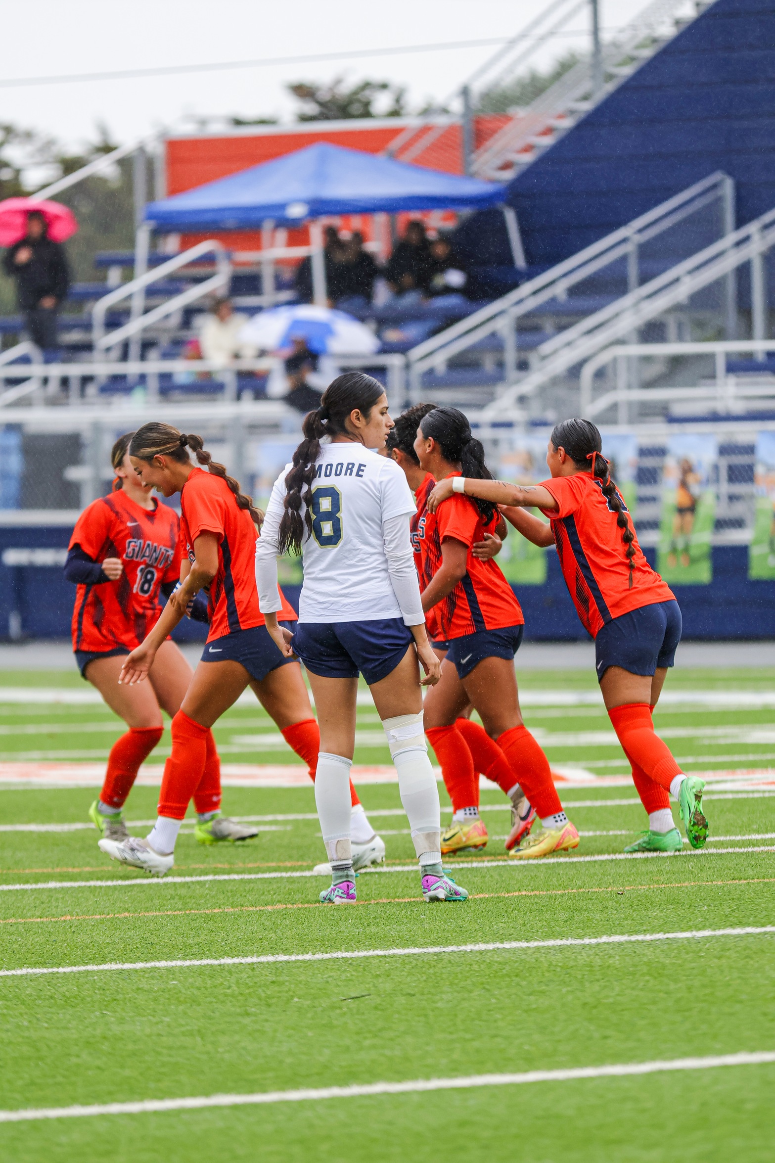 College of the Sequoias' women's soccer team celebrating with Melanie Navarro (17) after her first of two goals against Lemoore College on November 14, 2025.